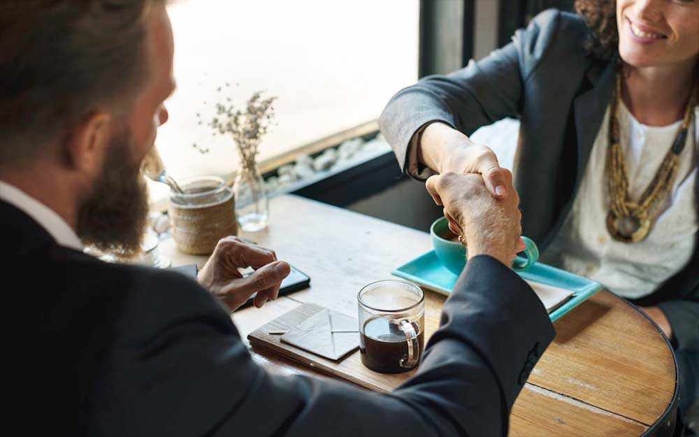 Deal - shaking hands - WestmountMag.ca