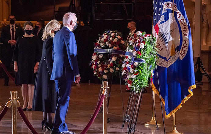 Bidens at tribute to slain policeman 