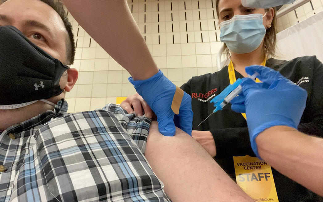 man getting vaccinated