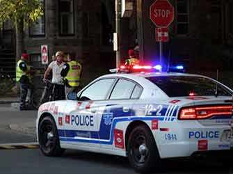 Police ticketing cyclist - WestmountMag.ca