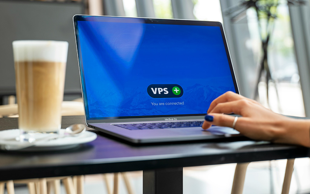 Person using vps on laptop computer - Image: Petter Lagson - Unsplash