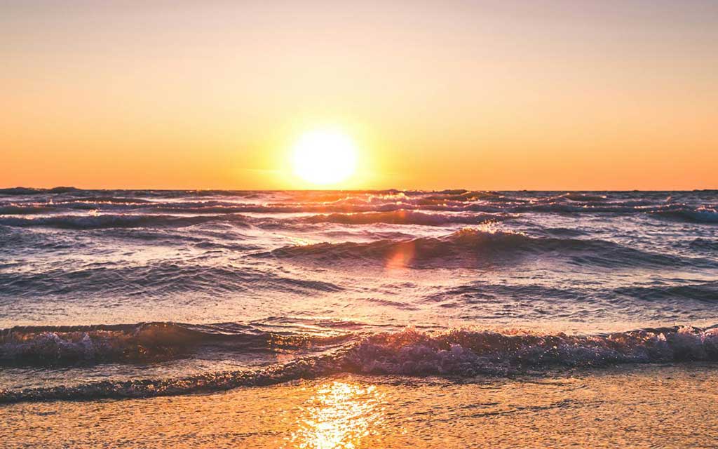 waves at sunset